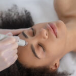 HydraFacial treatment on African American Woman